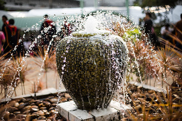 colorful Jar fountain in the garden pool
