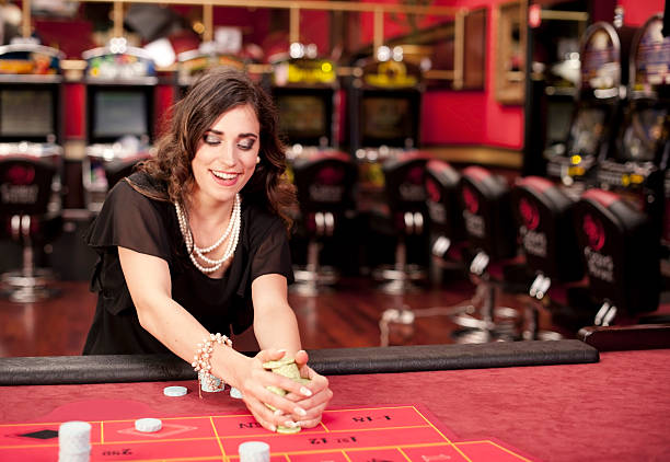 istock Young Woman Winning at American Roulette Game 536272873