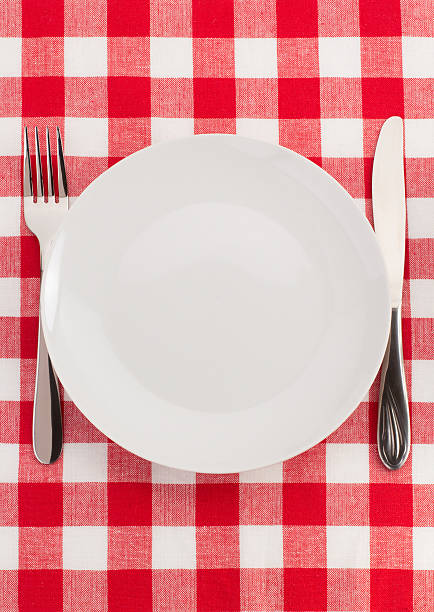 istock knife and fork at plate on napkin 536275341