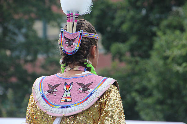 Glen Oaks, NY, USA - July 26, 2014: Back of Native American Female at annual pow-wow at Queens County Farm Museum.
