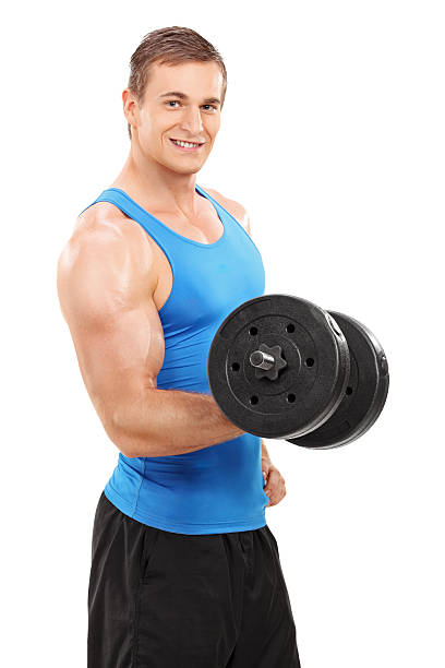 istock Young male athlete exercising with a small barbell 536275729