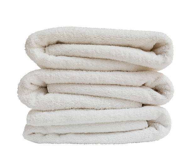 istock Stack of white plush towels isolated on white background 536287243