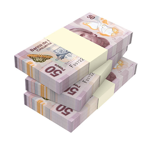istock Mexican pesos isolated on white background. 536287571
