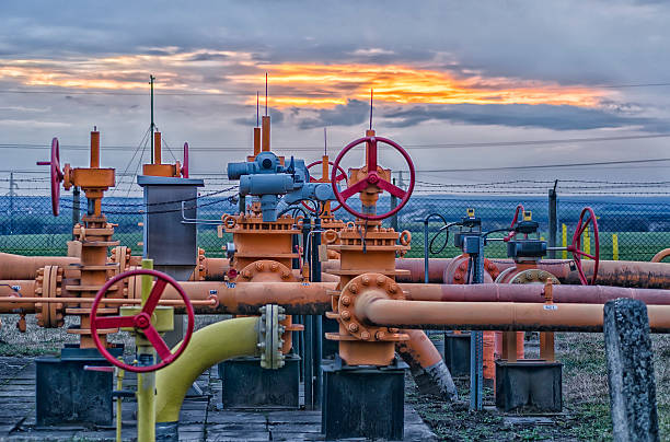 Gas field Pipeline transportation is most common way of transporting natural gas. pipe smoking pipe stock pictures, royalty-free photos & images