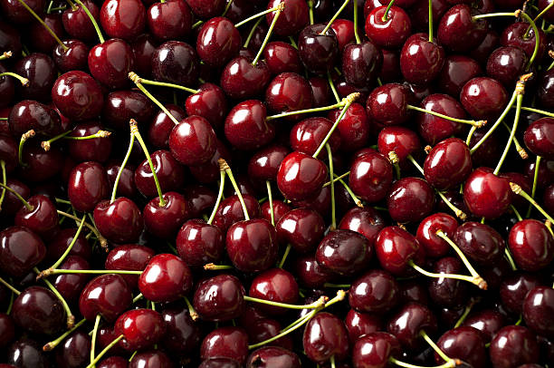 cherry backgorung - black cherries stock-fotos und bilder