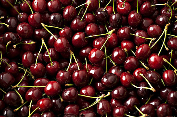cherry backgorung ripe delicious cherries cherry stock pictures, royalty-free photos & images