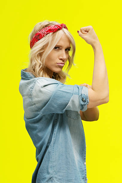 istock Woman flexing muscle 536291434