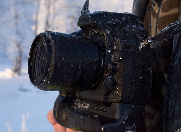 istock Professional digital photo camera wrapped in ice 536292169
