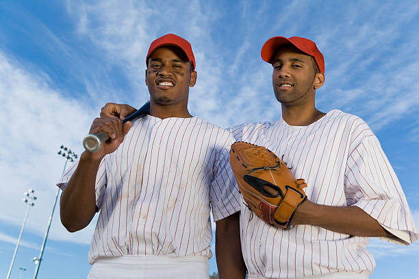 istock Baseball Team Mates Against Cloudy Sky 536292481