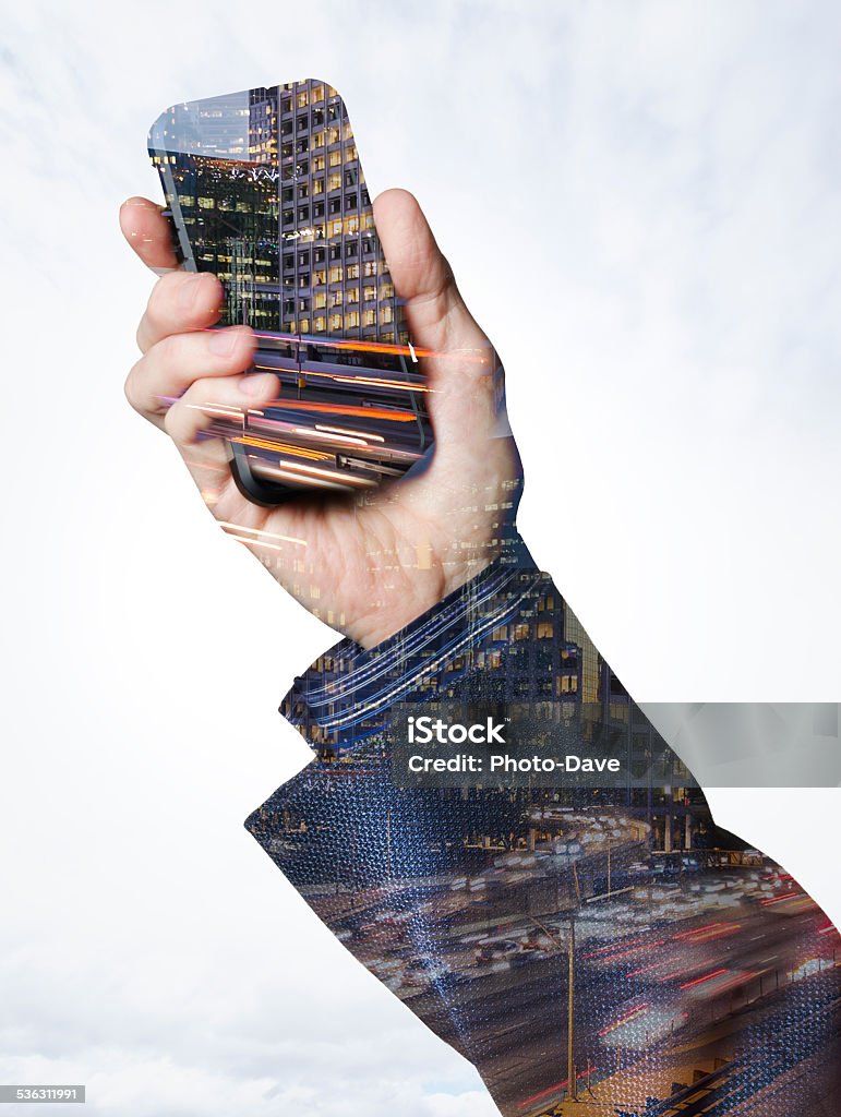 Colorfully connected Hand holding a smart phone with city lights 2015 Stock Photo