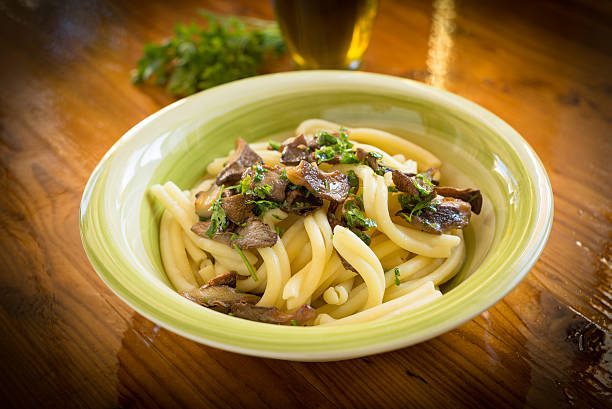 pasta casereccia with mushrooms, italian cuisine stock photo