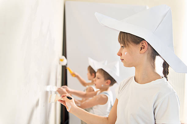 istock Kids painting their home 536312967