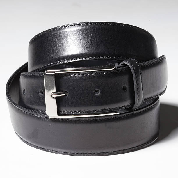 istock Black belt with a simple buckle on white background 536313103