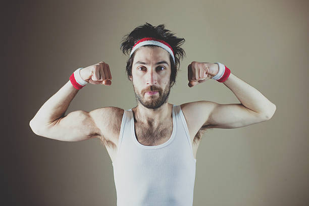 sport nerd - bicep human arm macho flexing muscles stock-fotos und bilder
