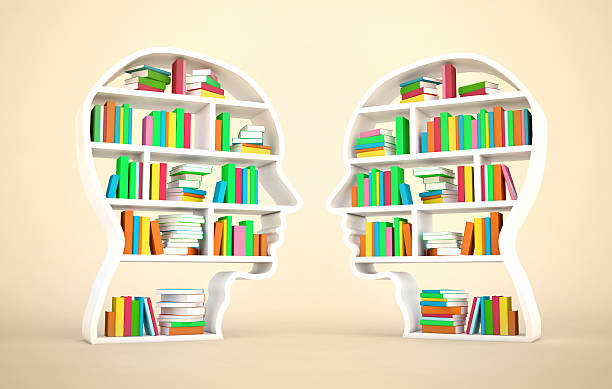 istock Two heads facing and sharing cultural knowledge with books 536313943