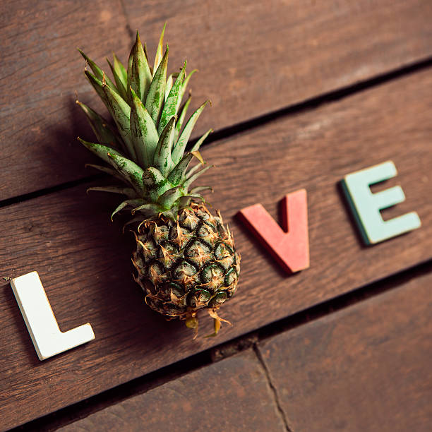 istock word love on the wooden floor 536315955