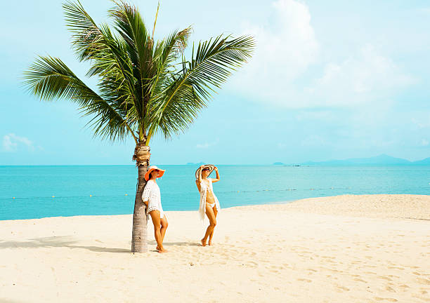 istock woman on a tropical beach 536328846
