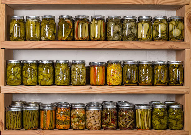 istock Storage shelves with canned food 536349359