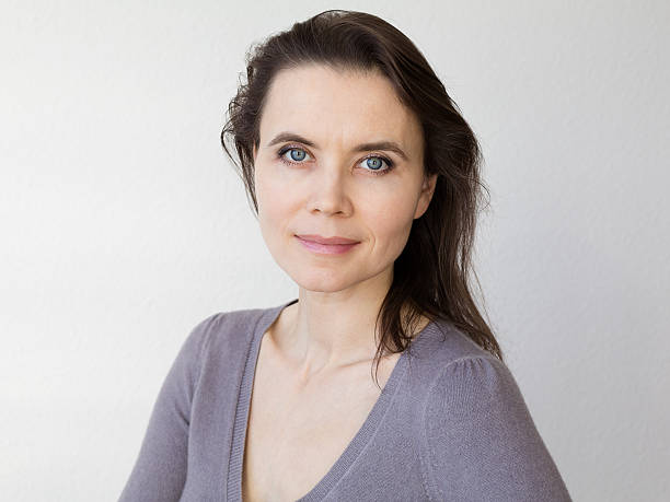istock Woman with attractive smile looking into camera 536349381