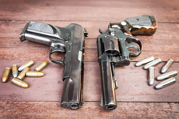 .357 magnum concealed revolver gun personal defence on leather background