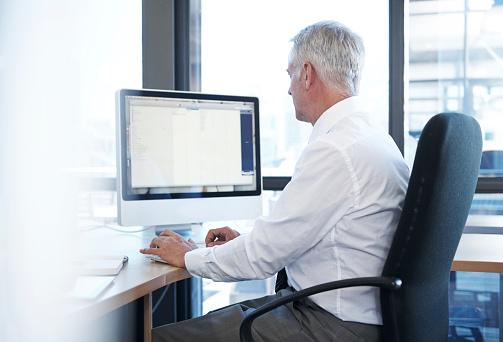 Senior businesswoman working in the modern office