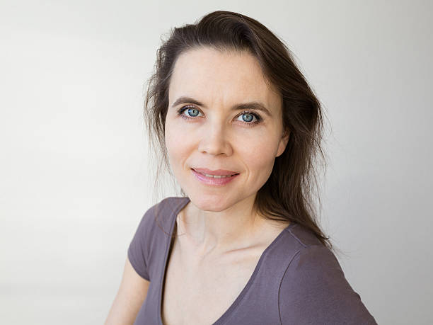 istock Woman with attractive smile looking into camera 536350449