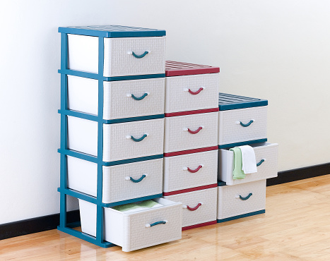 Stacks of plastic drawers for home or office using