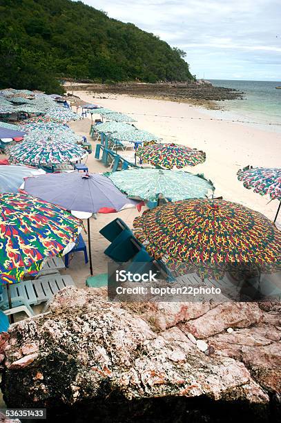 Beach Umbrella And Deck Chairs On The White Sand Stock Photo - Download Image Now - 2015, Beach, Chair