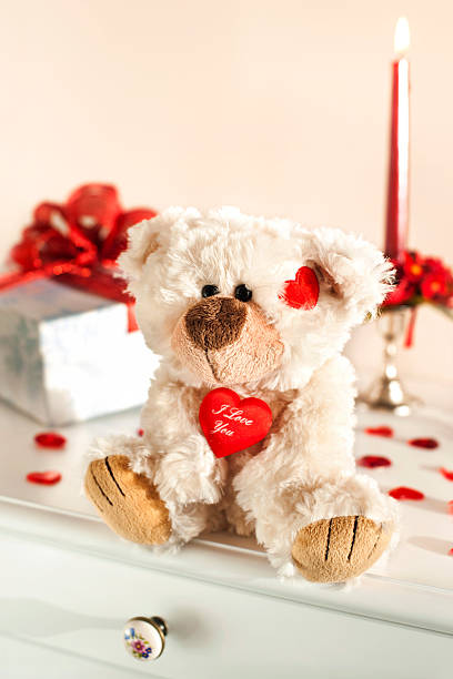 istock Teddy bear toy and gift box. Valentine's day surprise. 536351587