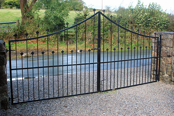 istock Black security gates protecting a residential property 536362694
