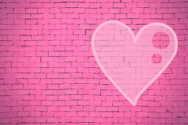 istock brick wall graffiti heart, valentines day background 536402915