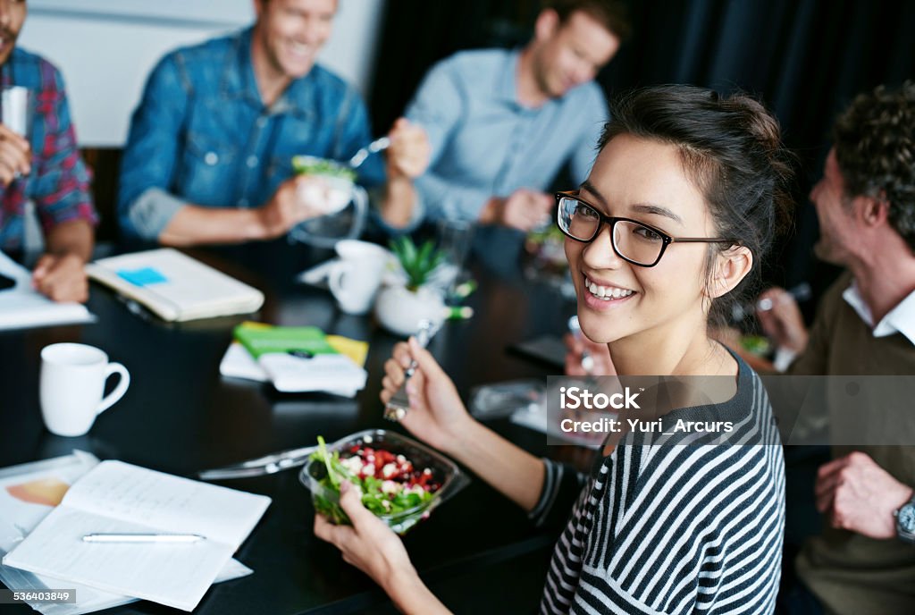 Getting creative over lunch Portrait of businesspeople eating lunch during a meetinghttp://195.154.178.81/DATA/istock_collage/1216319/shoots/784991.jpg Healthy Lifestyle Stock Photo