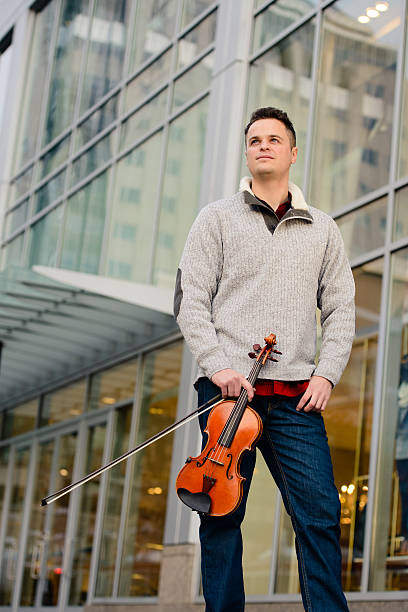 istock Attractive Confident Male Violinist Standing Tall 536406763