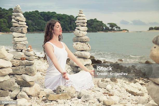 Yoga On The Beach Stock Photo - Download Image Now - 2015, Adult, Adults Only