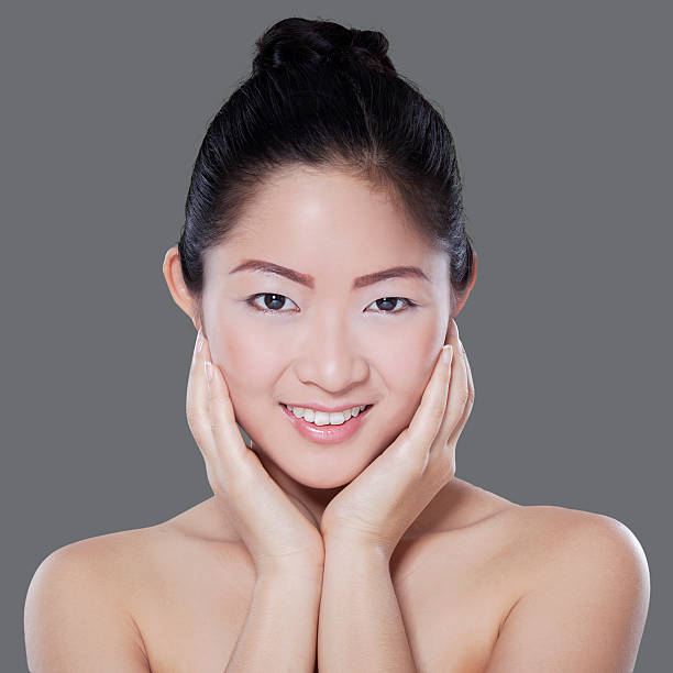 istock Pretty woman on grey background 536407465