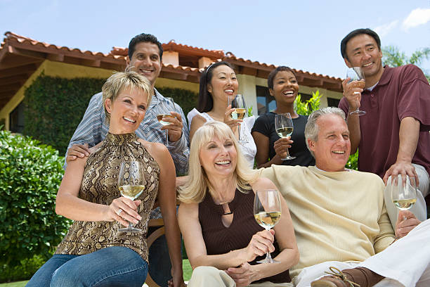 istock Friends drinking wine outdoors 536408453