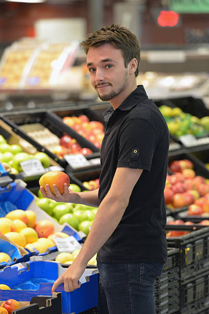 istock One young man shopping in a supermarket 536456579