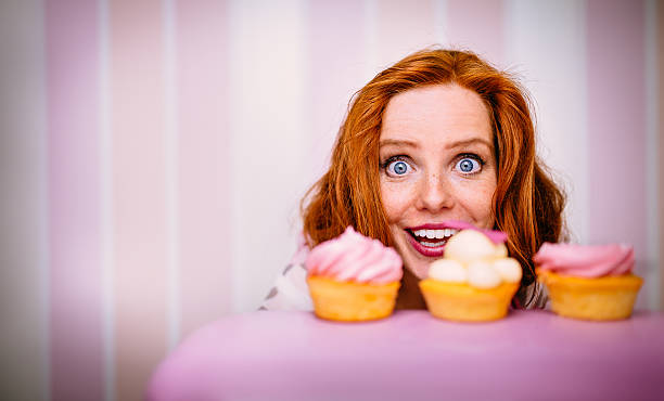 istock Young Woman Really Wants To Eat Cupcakes 536457257