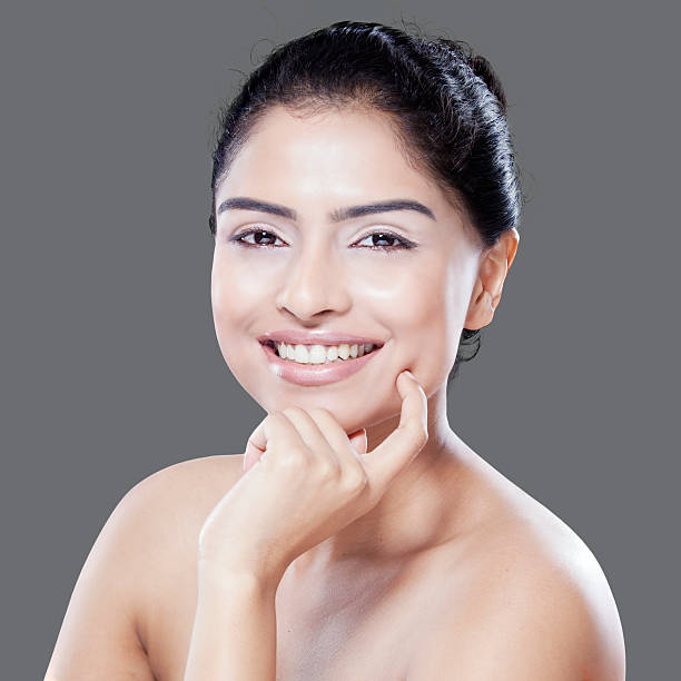 istock Cute model after skincare smiling at camera 536458547