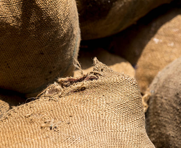 istock Gunny sack rice overlap each other in storage. 536459903