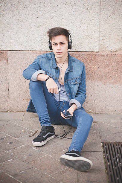 istock young handsome alternative dark model man in town 536460545
