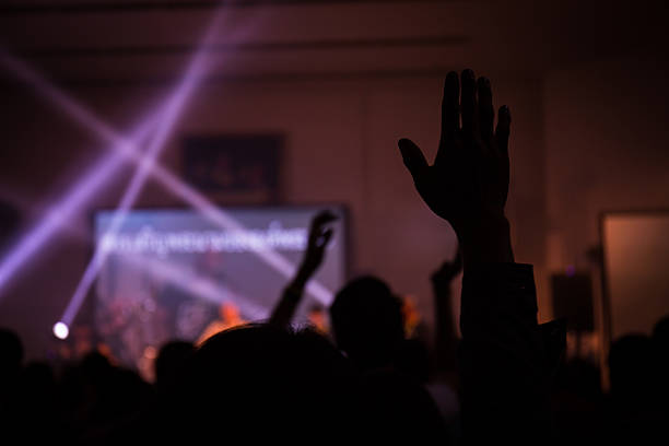 istock christian music concert with raised hand 536504095