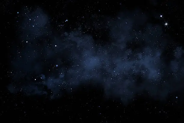 Photo of night sky with bright stars and blue nebula