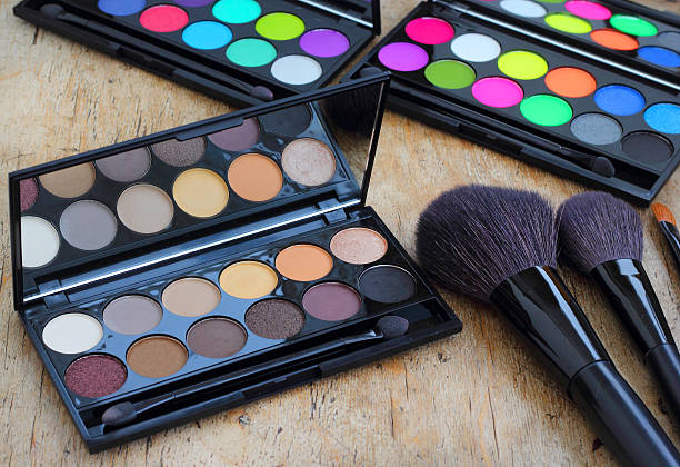 istock Makeup brushes make-up eye shadows vintage wooden background 536507653