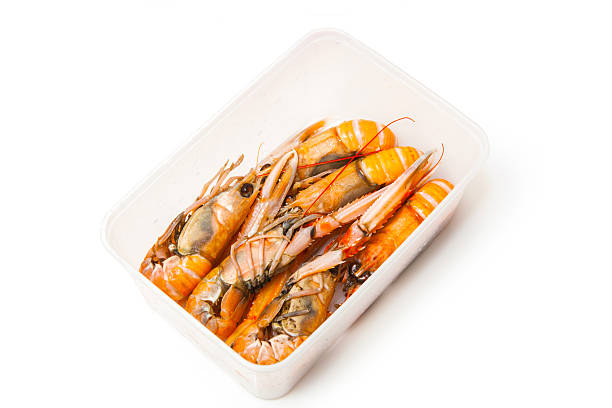 istock Box of langoustine isolated on a white studio background. 536508057
