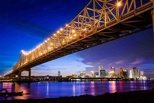 New Orleans Skyline at Night, Louisiana, USA The New Orleans Skyline mississippi river stock pictures, royalty-free photos & images