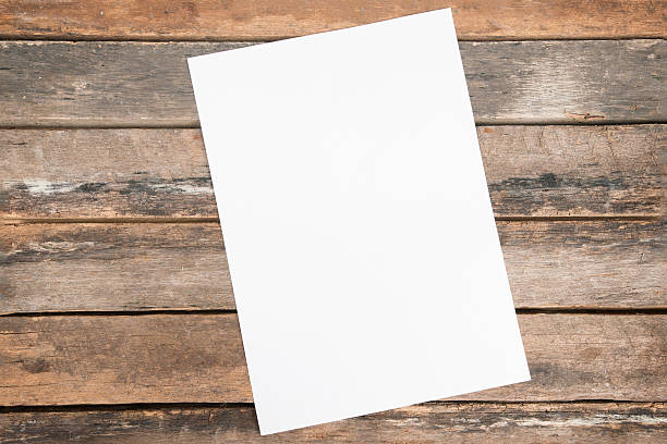 istock old brown wooden boards and blank paper 536510703