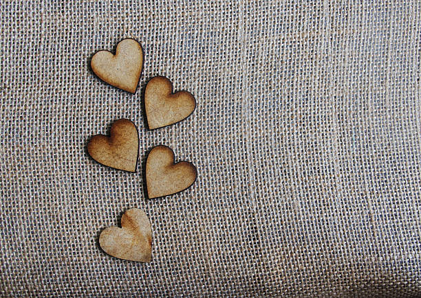 istock Wooden hearts on a black chalkboard 536510971