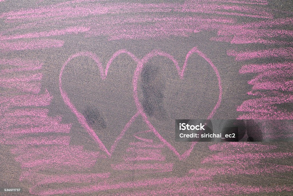 Hand drawn pink hearts on chalkboard background. 2015 stock illustration