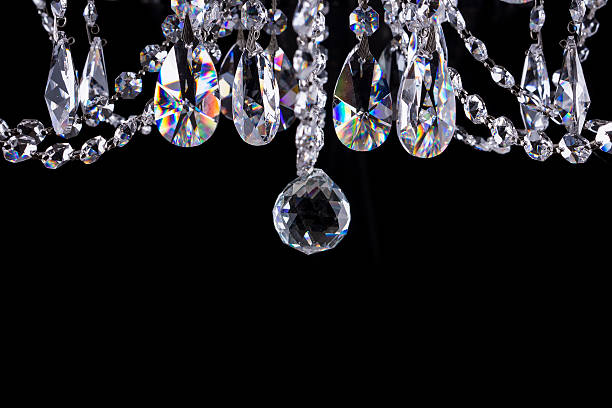 istock Crystal chandelier close-up on black 536553141